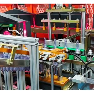 Close-up of Aomiwater 4 cavity full auto bottle blowing machine preform feeding mechanism