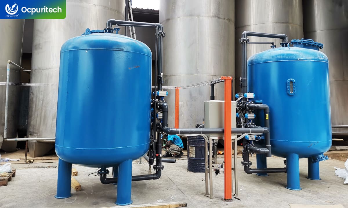 Multimedia and activated carbon pretreatment for juice production